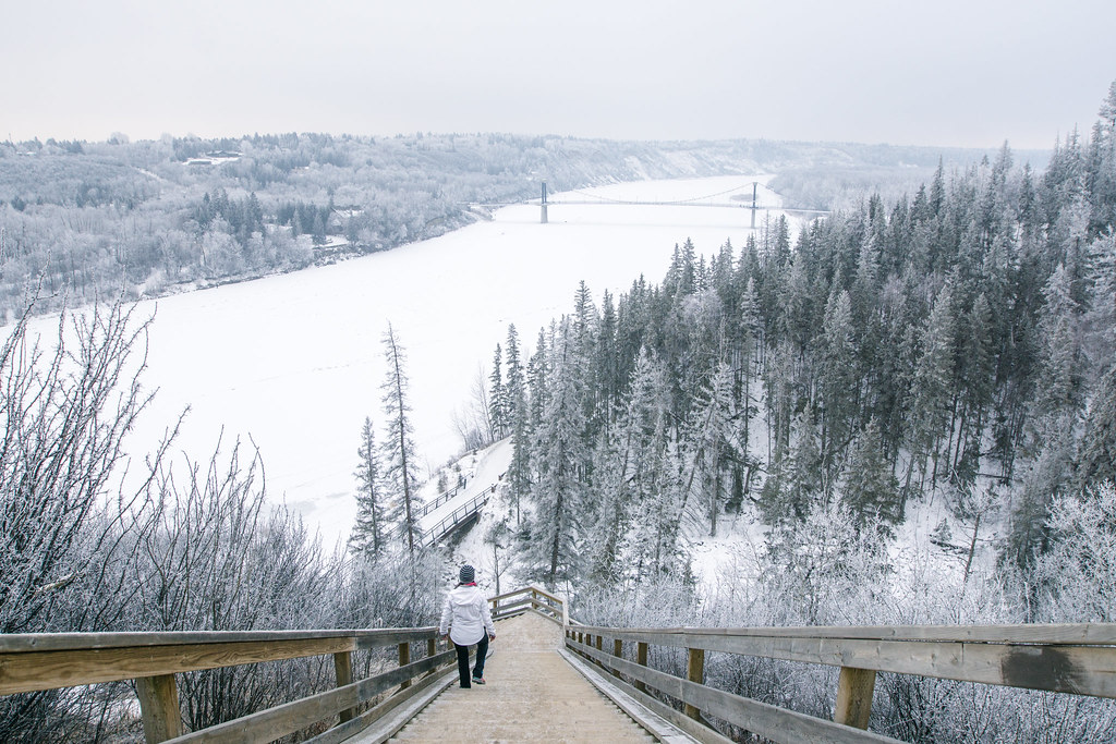 Woman walking down stairs in Edmonton